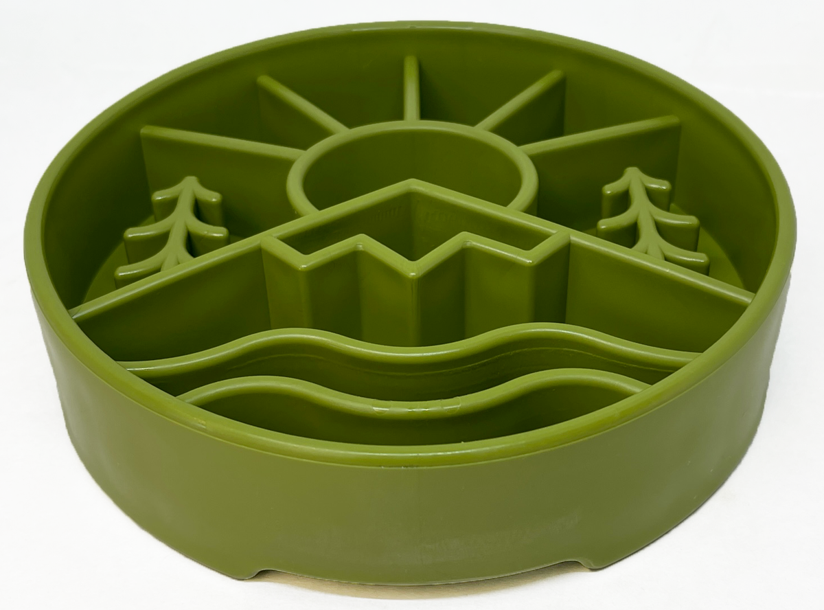 Orange slow-feeder bowl showing raised terrain pattern