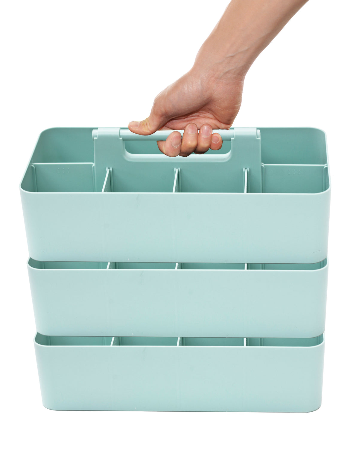 Hand lifting three stacked mint portable organizer caddies with carry handles and divided compartments